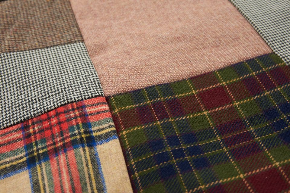 Plaid and tweed fabric pieces sewn into patchwork